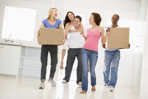 Removal crew handling household items during a local Bermondsey move