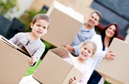 Removal team planning a move in Bermondsey with boxes and furniture